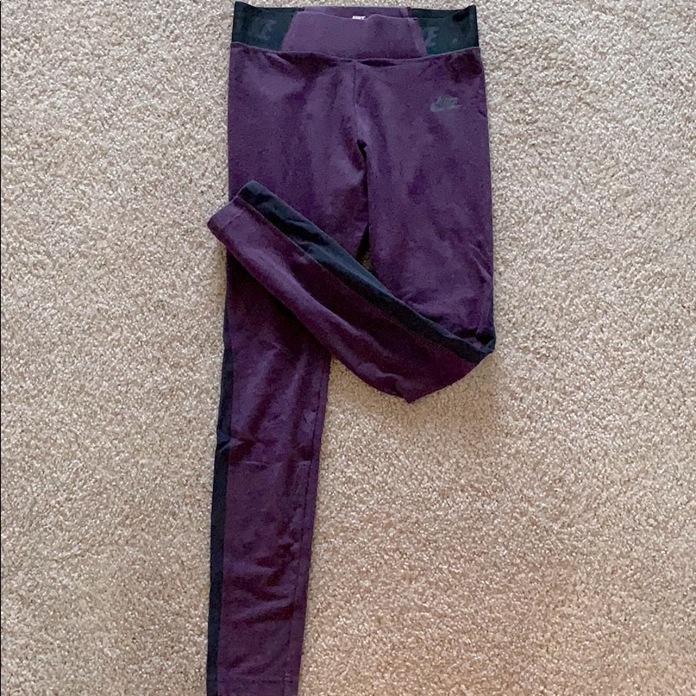 Purple Nike workout leggings